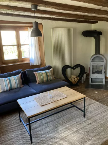 Wohnzimmer Wohnung Mondschaukel im Hochparterre